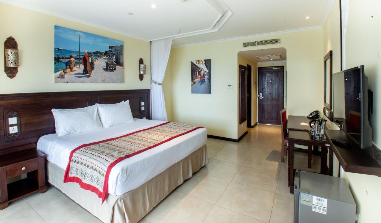 Prideinn Paradise Beach Resort & Spa Mombaça Exterior foto A room at the hotel