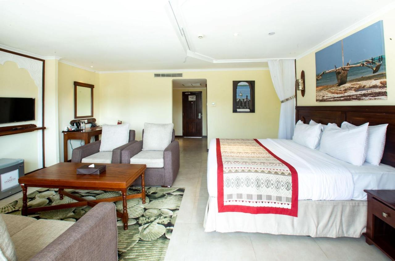 Prideinn Paradise Beach Resort & Spa Mombaça Exterior foto A room at the hotel